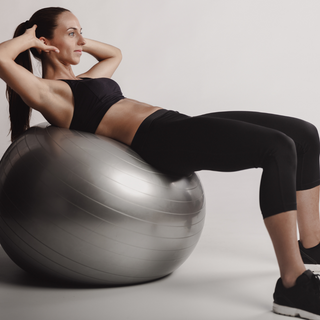 Woman working out on an exercise ball